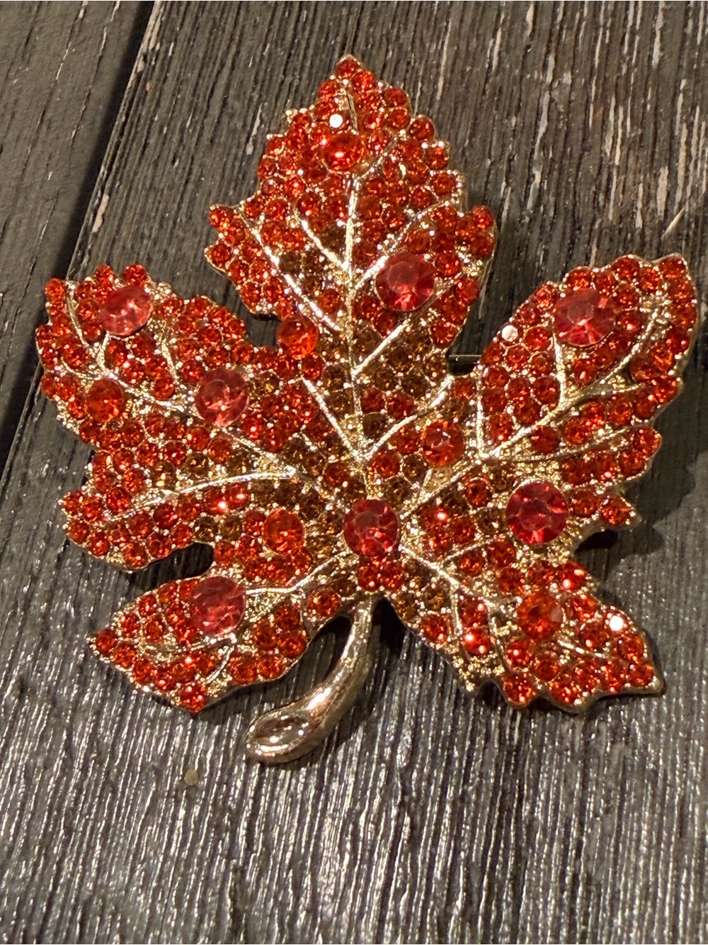Maple Leaf gold tone Brooch in Orange Red crystals